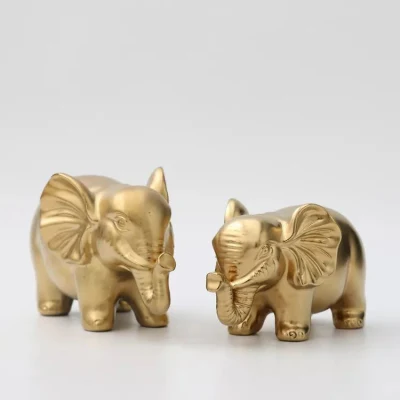 Artículos para el hogar de moda Forma de elefante dorado de lujo Pareja Pequeño animal personalizado Decoraciones para el hogar Adornos de cerámica para mesa Hogar Uso diario